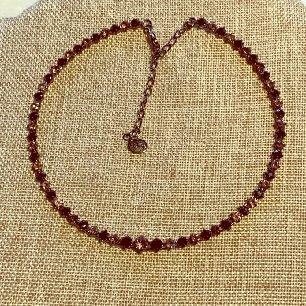 Claire’s beaded choker.